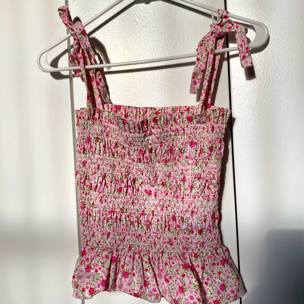 Likely smocked floral top